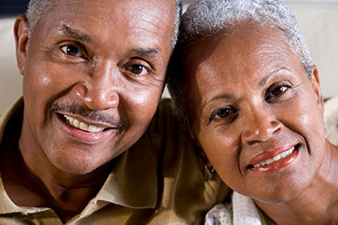Photo of a man and woman smiling for a picture. Link to Life Stage Gift Planner Over Age 65 Situations.